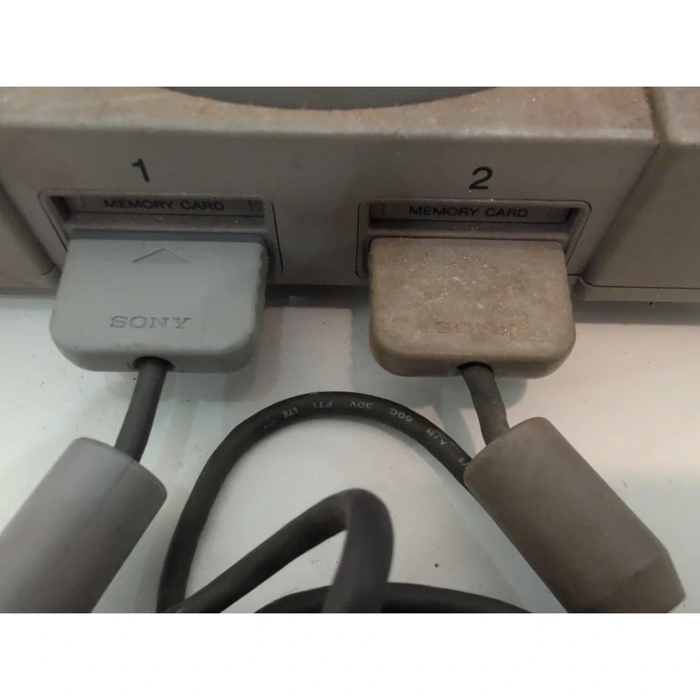 Sony PlayStation 1 Gray  System Tested Working Plus 2 Controllers 8 Games Cords